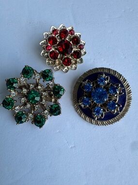 Set of Three Vintage Colorful Sunburst Snowflake Rhinestone Brooch Pins